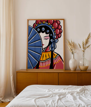 Traditional Asian opera character with fan and decorative headpiece