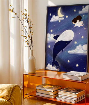 Whimsical night scene with flying angel and whale