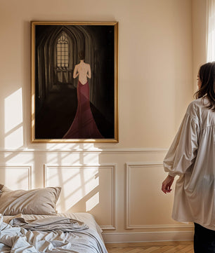 Elegant woman in a red dress inside a gothic hallway