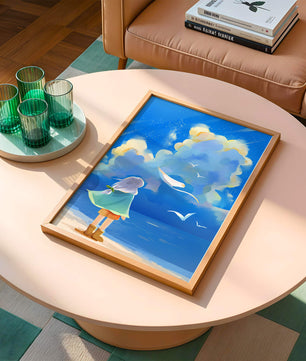Young person gazing at a vibrant seaside sky with birds flying