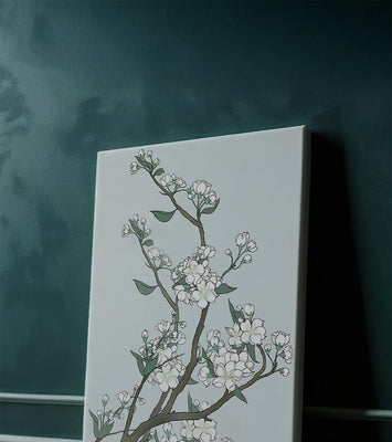 Delicate cherry blossoms on a soft blue background