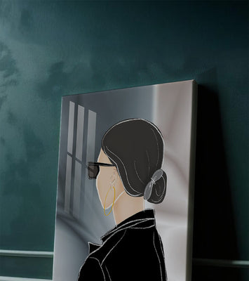 Modern woman with sunglasses and gold hoop earrings