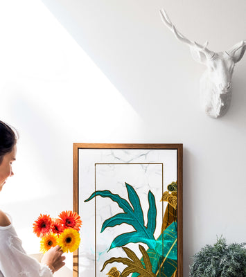 Abstract botanical art with blue and gold leafy designs