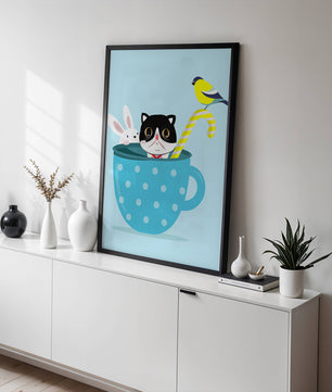 Playful illustration of cat, rabbit, and bird in a teacup