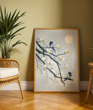 Birds on blossoming branches under a serene moonlit sky