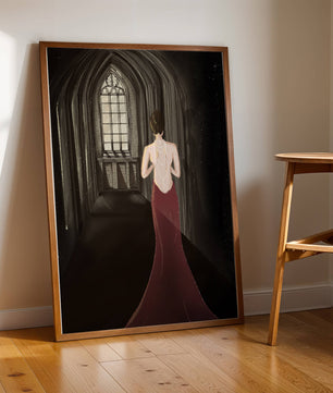 Elegant woman in a red dress inside a gothic hallway