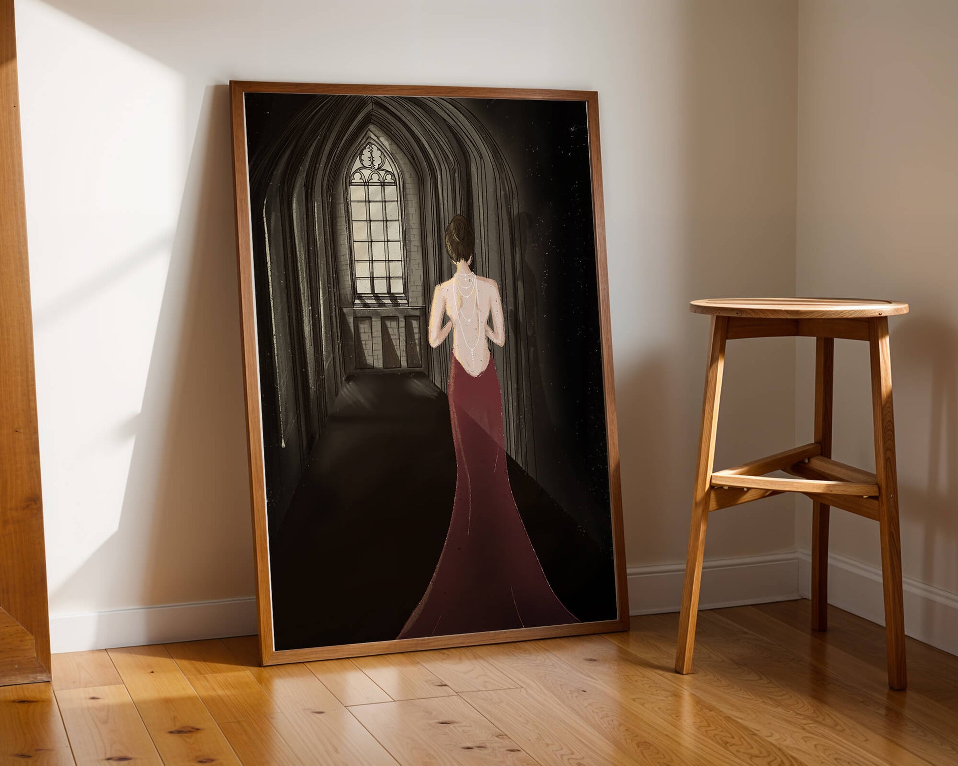 Elegant woman in a red dress inside a gothic hallway