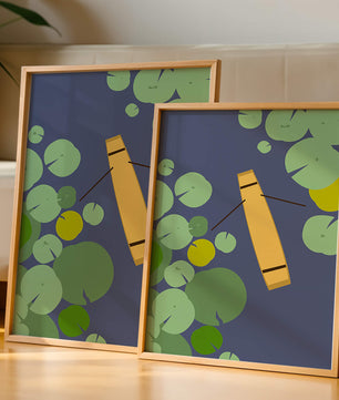 Top view of a yellow canoe among green lily pads on a calm lake