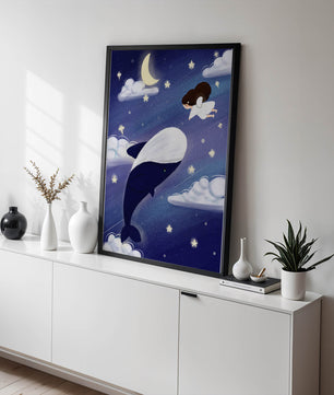 Whimsical night scene with flying angel and whale