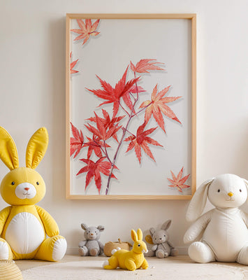 Delicate red maple leaves on white background