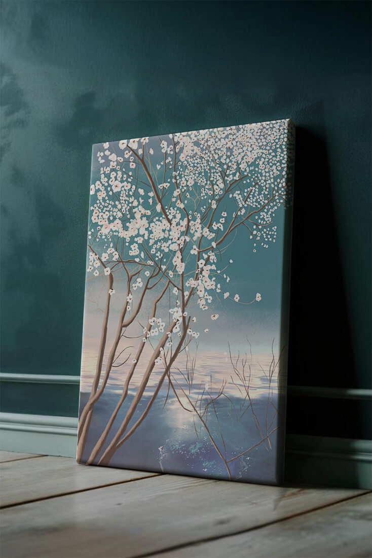 Serene landscape with blossoming tree over calm water reflection