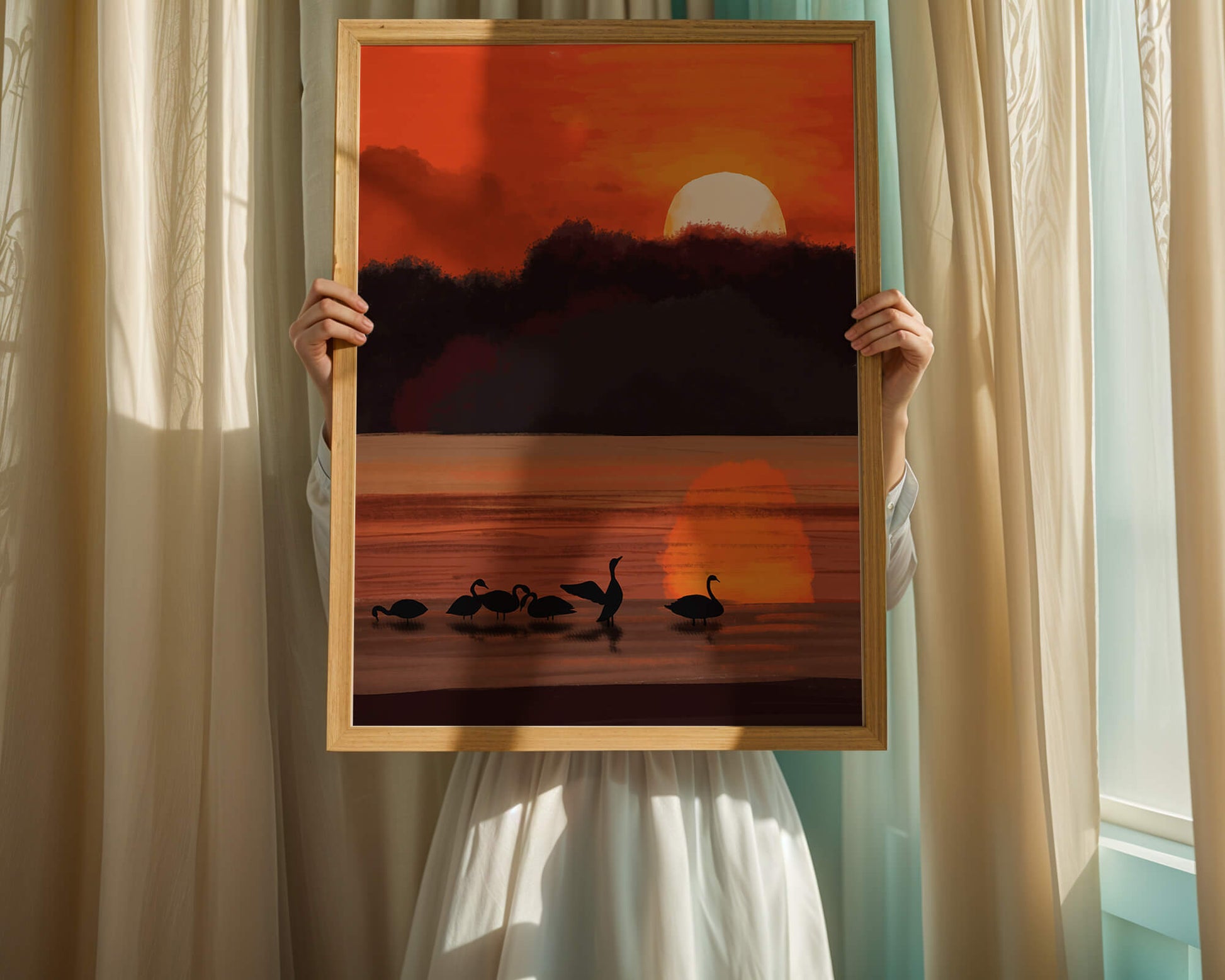 Serene sunset over a lake with silhouetted swans