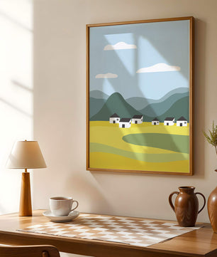 Pastoral Landscape with Mountains and Houses Under Blue Sky