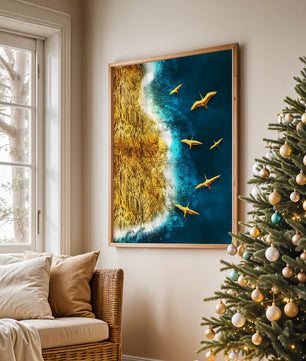 Golden beach landscape with vibrant ocean and flying seabirds