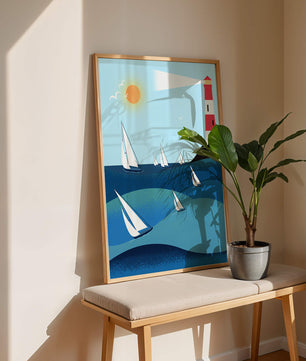 Coastal scene with sailboats and lighthouse on a bright sunny day
