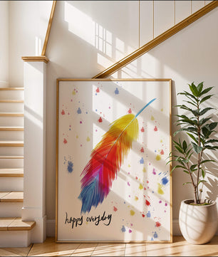 Colorful feather with inspirational message on abstract paint splatter background