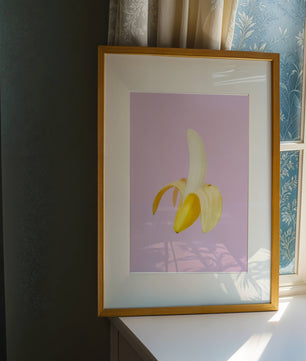 Open banana with purple background for vibrant decoration