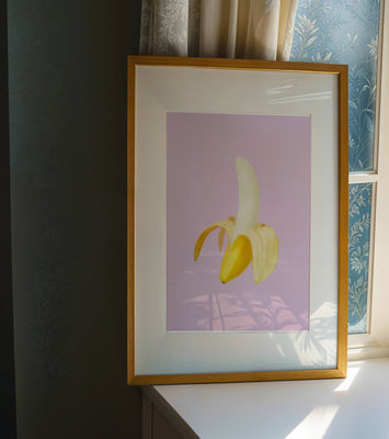 Open banana with purple background for vibrant decoration