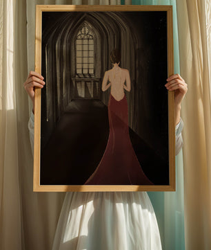 Elegant woman in a red dress inside a gothic hallway