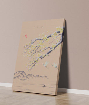 Tranquil landscape with blooming branches and flying cranes