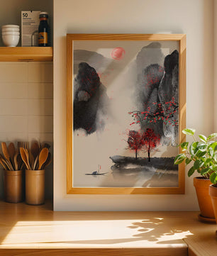 Serene landscape with red foliage and misty mountains