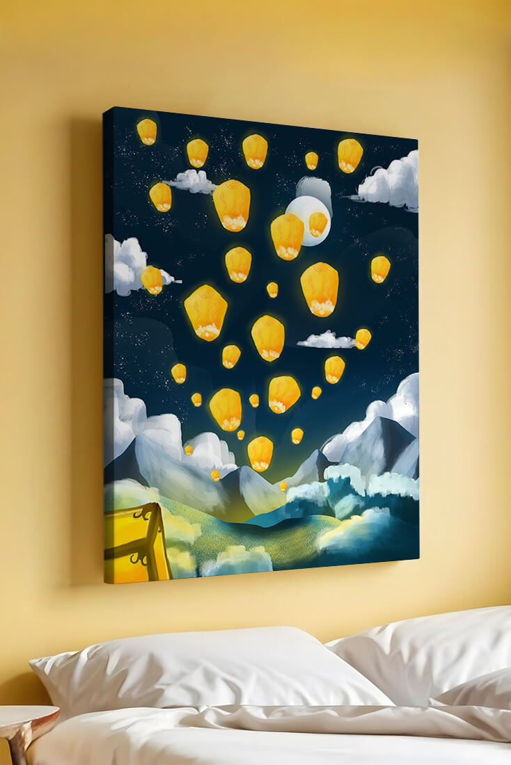 Lanterns floating in a starry night sky over mountains