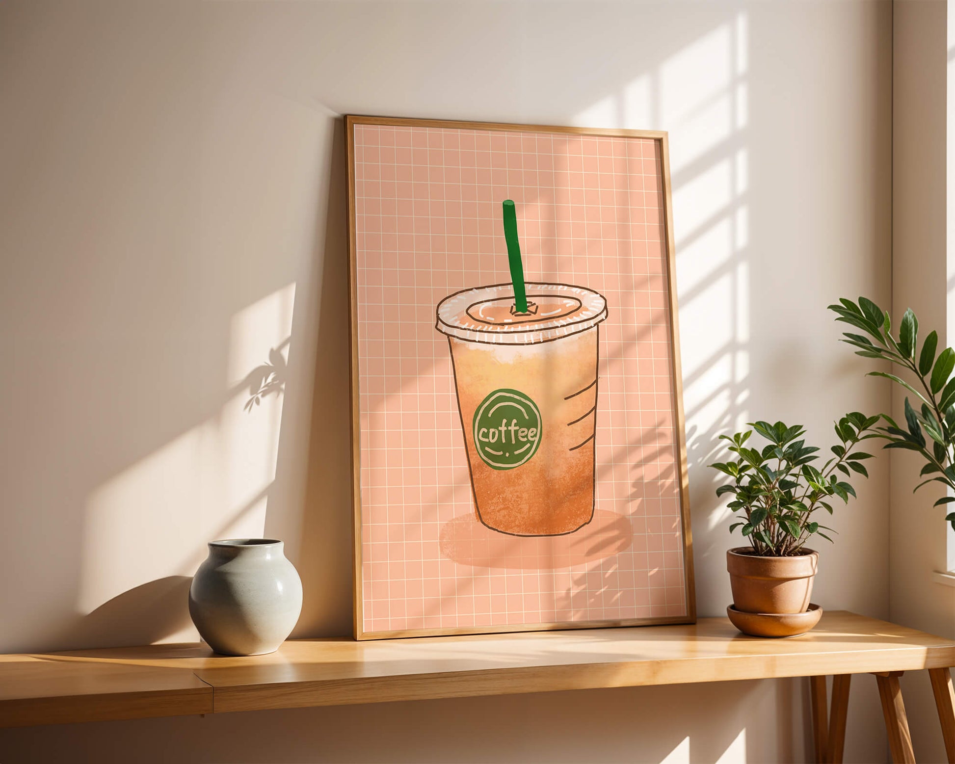 Illustrated iced coffee cup on peach grid background