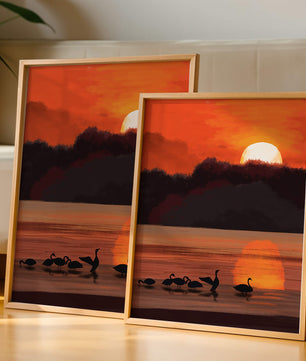 Ruhiger Sonnenuntergang über einem See mit Schwanensilhouette
