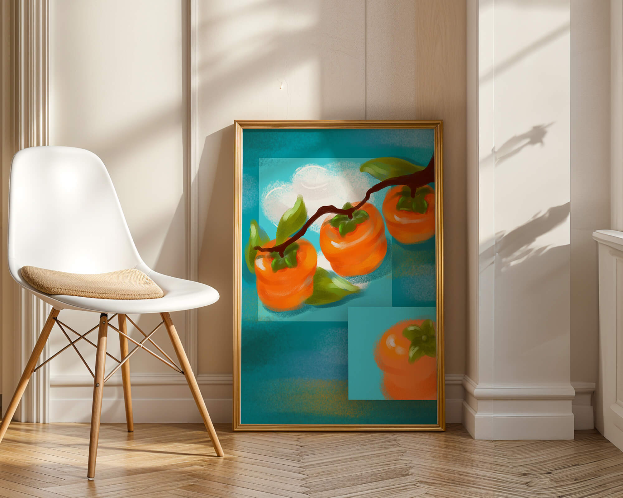 Vibrant persimmons on a branch with a blue background