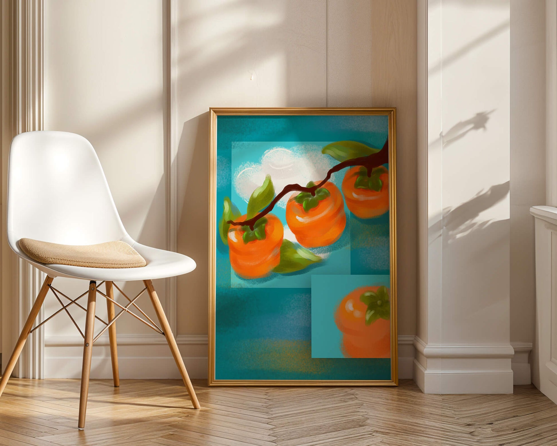 Vibrant persimmons on a branch with a blue background