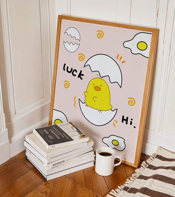 Chick hatching from an egg with cheerful expressions and fried egg motifs