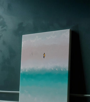 Serene beach with turquoise waves and solitary figure