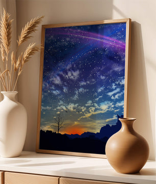 Starlit night sky with colorful sunset and silhouetted landscape