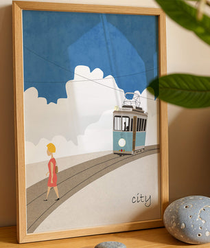 Urban scene with tram and pedestrian under a blue sky