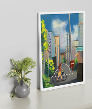 Young woman with bicycle in a quiet urban street