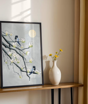 Birds on blossoming branches under a serene moonlit sky