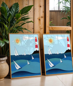 Coastal scene with sailboats and lighthouse on a bright sunny day