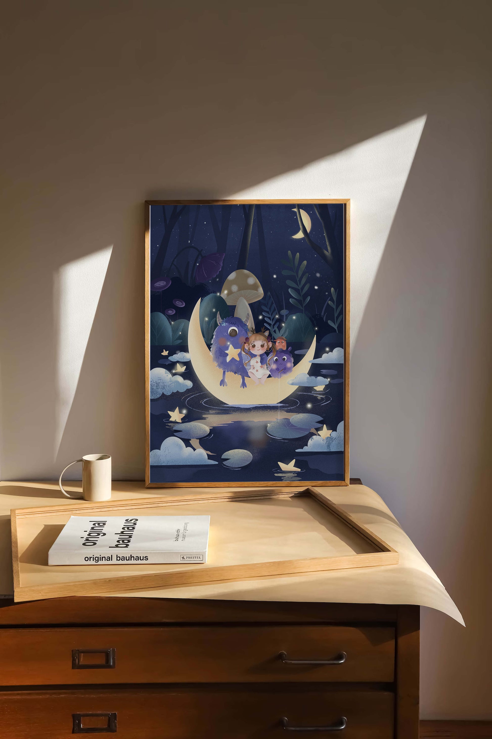 Dreamy night scene with a child and friendly monsters on a crescent moon