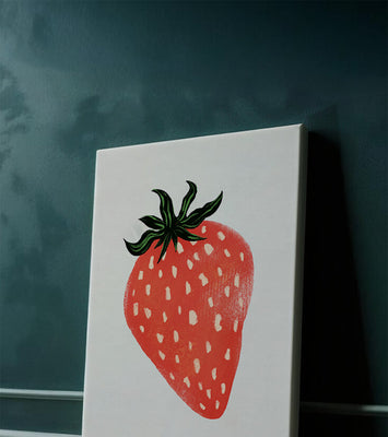 Illustrative design of a vibrant red strawberry with green leaves