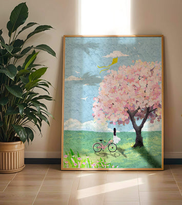 Springtime scene with cherry blossom and girl with bicycle