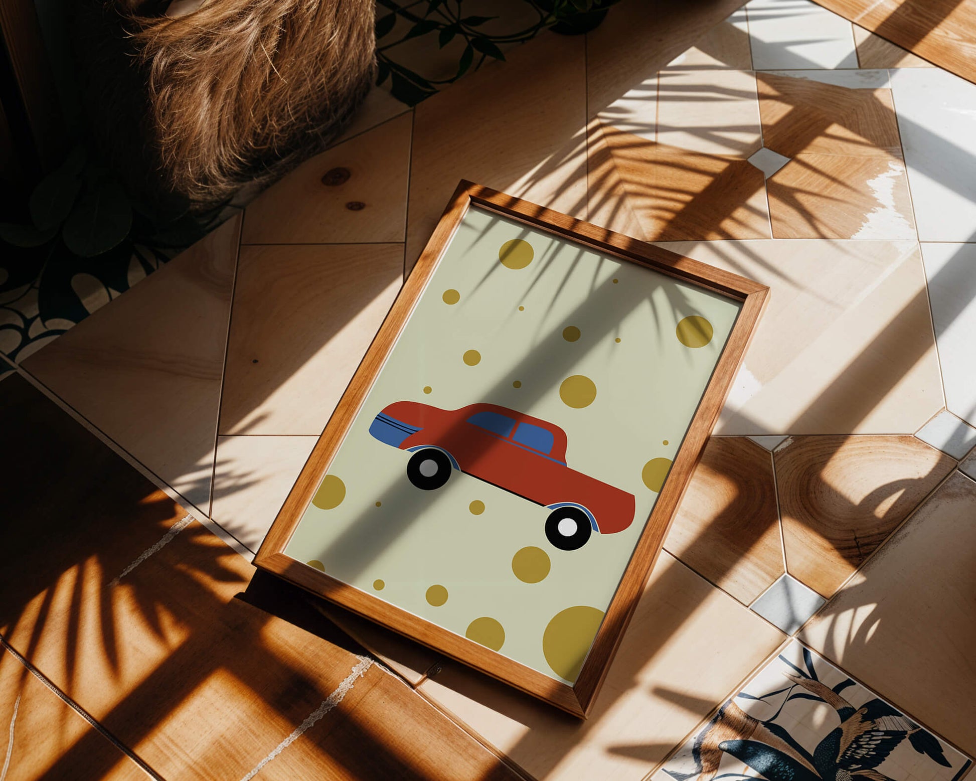 Abstract illustration of a red car with golden circles on a beige background