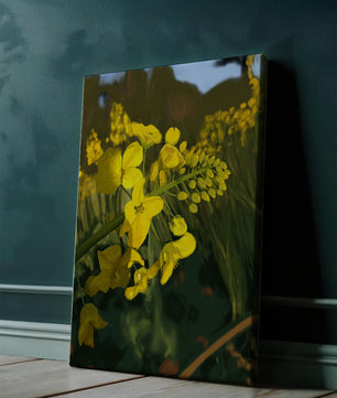 Close-up view of vibrant yellow flowers in a lush green field