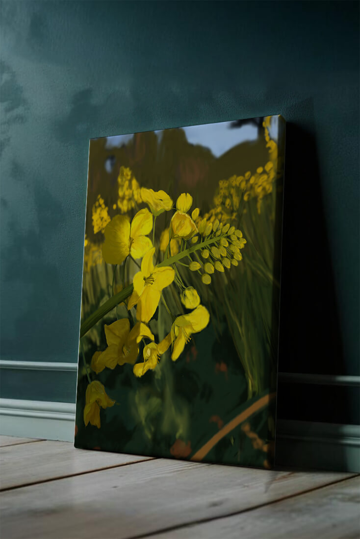 Close-up view of vibrant yellow flowers in a lush green field