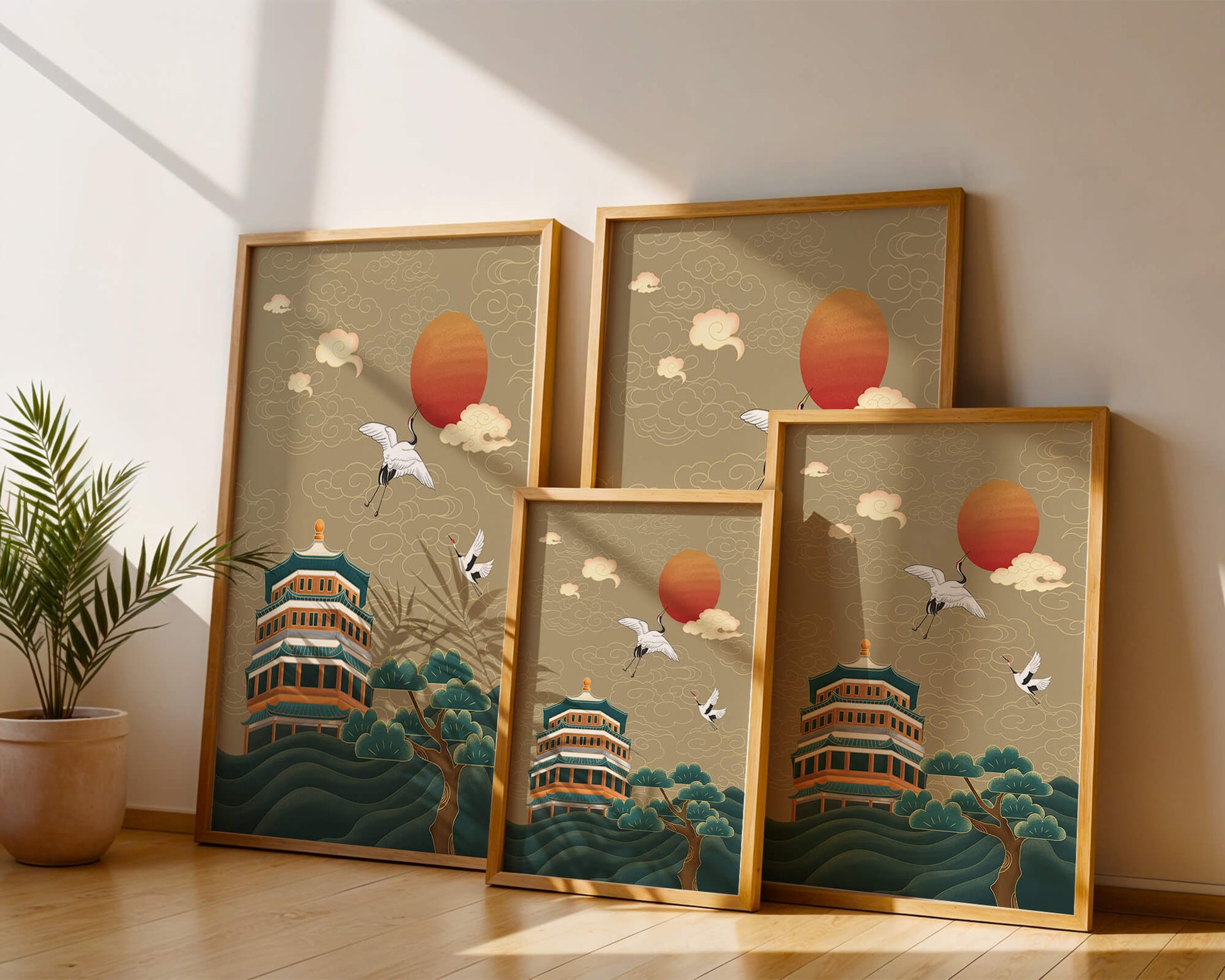 Obra de arte asiática tradicional con grullas y pagoda bajo un sol rojo