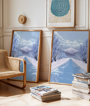 Serene winter landscape with mountain and snowy trees reflecting in water