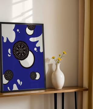 Graphic design featuring cookies and milk splashes on blue background