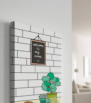 Chalkboard welcome sign with potted plants and a toy car