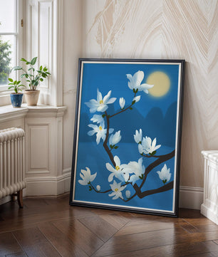 White magnolia branch under moonlight with blue background