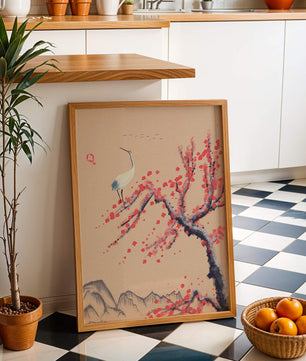 Elegant crane on cherry blossom tree with mountainous background