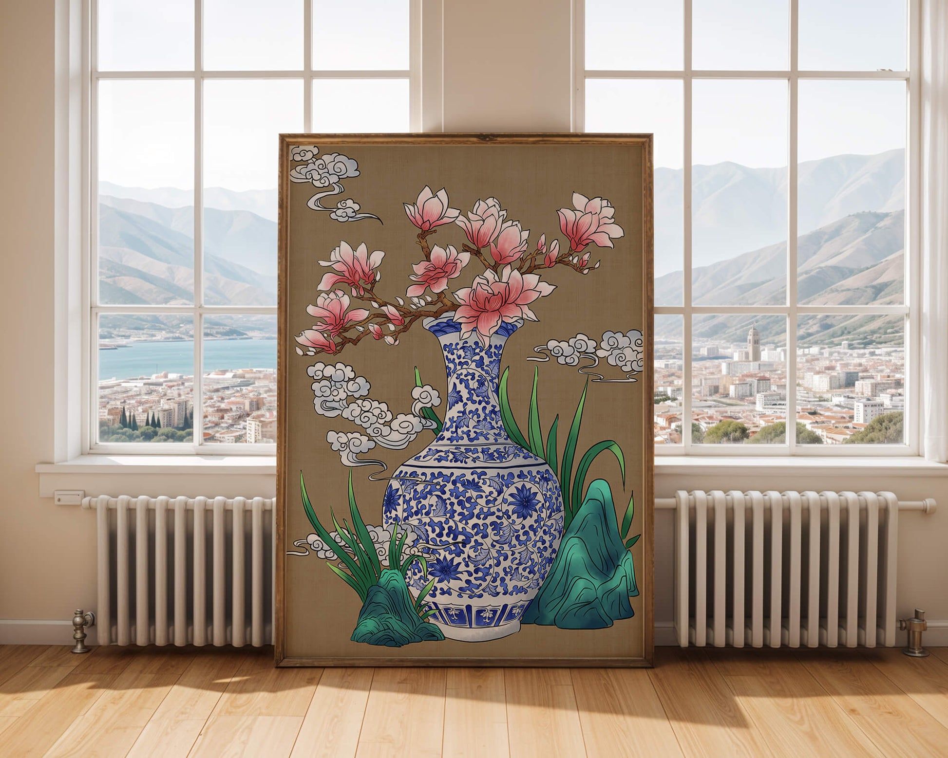 Elegante arreglo floral en jarrón de porcelana azul y blanca con magnolias.